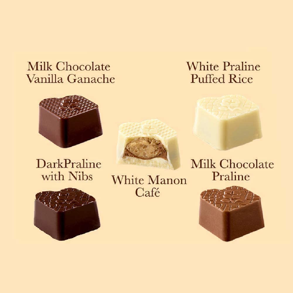 sabores sortidos dos bombons Leonidas sem adição de açúcar: chocolate de leite e ganache de baunilha, chocolate branco e praline de arroz tufado, chocolate negro com nibs de cacau, chocolate branco com sabor manon cafe, chocolate de leite com praline