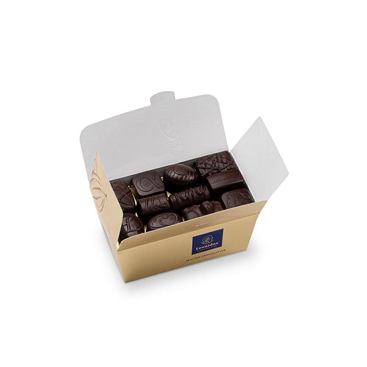 caixa dourada com bombons de chocolate negro da leonidas