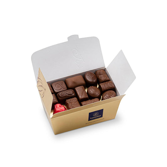 caixa dourada com bombons de chocolate de leite da leonidas